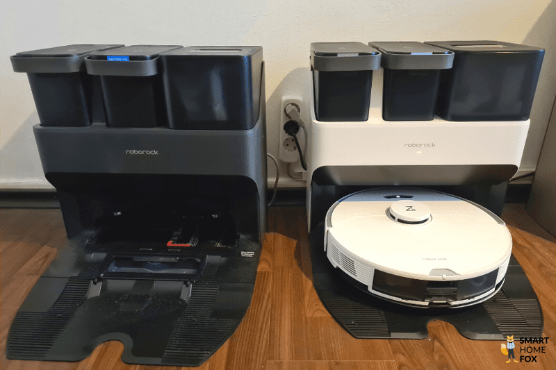 Черная и белая станции Ultra Station стоят перед белой стеной